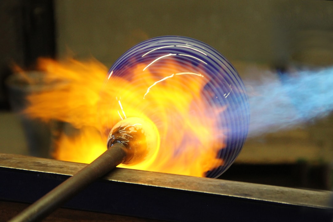 The Art of Drawing Readers In: Your attractive post title goes here A local glassblower artist allowed me to watch the process. It was SO hot in there - even on a cool fall evening. His timing was precise.